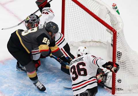 William Carrier #28 of the Vegas Golden Knights scores a goal Corey Crawford #50 and Matthew Highmore #36 of the Chicago Blackhawks during the second period in Game One of the Western Conference First Round. (Photo by Jeff Vinnick/Getty Images)