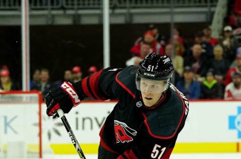 RALEIGH, NC – NOVEMBER 1: Jake Gardiner #51 of the Carolina Hurricanes shoots the puck during an NHL game against the Detroit Red Wings on November 1, 2019 at PNC Arena in Raleigh, North Carolina. (Photo by Gregg Forwerck/NHLI via Getty Images)