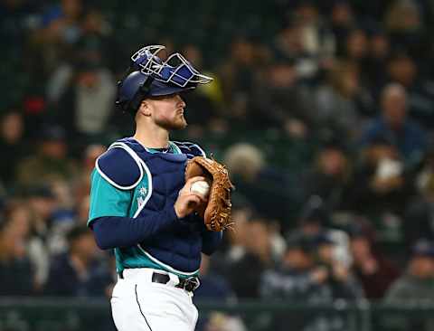 SEATTLE, WA – APRIL 13: Mike Marjjama #10 of the Seattle Mariners prepares to throw the ball back to the mound in the first inning against the Oakland Athletics on April 13, 2018 in Seattle, Washington. The Seattle Mariners beat the Oakland Athletics 7-4. (Photo by Lindsey Wasson/Getty Images)