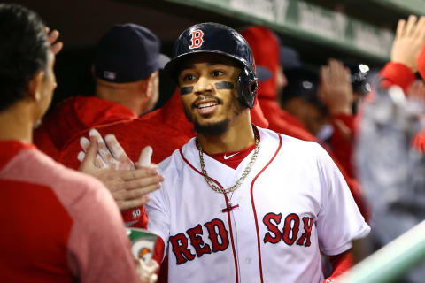 BOSTON, MA – SEPTEMBER 24: Mookie Betts #50 of the Boston Red Sox returns to the dugout after hitting a two-run home run in the second inning of a game against the Baltimore Orioles at Fenway Park on September 24, 2018 in Boston, Massachusetts. (Photo by Adam Glanzman/Getty Images)