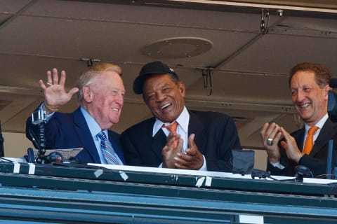 SAN FRANCISCO, CA – OCTOBER 02: Los Angeles Dodgers broadcaster Vin Scully is congratulated on the last game of his 67-year career by hall of famer Willie Mays and San Francisco Giants CEO Larry Baer during the fourth inning at AT