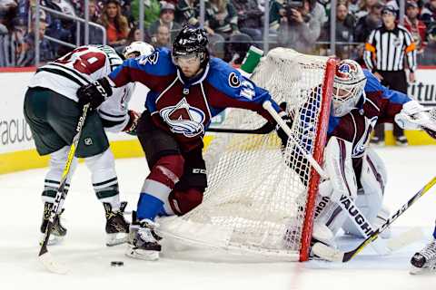 Apr 6, 2017; Denver, CO, USA; Colorado Avalanche goalie Calvin Pickard (31) looks on as defenseman Mark Barberio (45) battles with Minnesota Wild right wing Jason Pominville (29) for the puck in the third period at the Pepsi Center. The Wild won 4-3. Mandatory Credit: Isaiah J. Downing-USA TODAY Sports