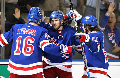 NEW YORK, NEW YORK – MAY 11: Adam Fox #23 (C) of the New York Rangers celebrates his second period goal against the Pittsburgh Penguins in Game Five of the First Round of the 2022 Stanley Cup Playoffs at Madison Square Garden on May 11, 2022 in New York City. (Photo by Bruce Bennett/Getty Images)