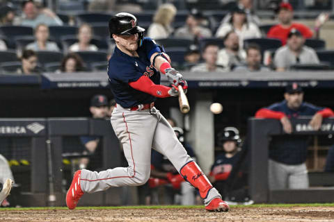 Jun 11, 2023; Bronx, New York, USA; Boston Red Sox shortstop Enrique Hernandez (5) hits a single against the New York Yankees during the eighth inning at Yankee Stadium. Mandatory Credit: John Jones-USA TODAY Sports