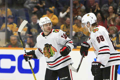 NASHVILLE, TN – NOVEMBER 16: Chicago Blackhawks left wing Alex DeBrincat (12) and right wing Patrick Kane (88) are shown during the NHL game between the Nashville Predators and Chicago Blackhawks, held on November 16, 2019, at Bridgestone Arena in Nashville, Tennessee. (Photo by Danny Murphy/Icon Sportswire via Getty Images)