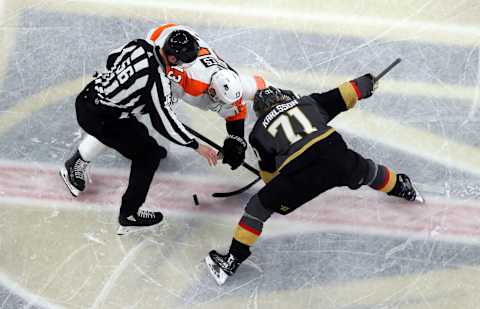 LAS VEGAS, NEVADA – JANUARY 02: William Karlsson #71 of the Vegas Golden Knights faces off with Kevin Hayes #13 of the Philadelphia Flyers during the second period at T-Mobile Arena on January 02, 2020 in Las Vegas, Nevada. (Photo by Zak Krill/NHLI via Getty Images)