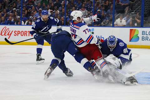 TAMPA, FLORIDA – JUNE 05: Frank Vatrano #77 of the New York Rangers goal tender interference on Andrei Vasilevskiy #88 of the Tampa Bay Lightning during the third period in Game Three of the Eastern Conference Final of the 2022 Stanley Cup Playoffs at Amalie Arena on June 05, 2022 in Tampa, Florida. (Photo by Bruce Bennett/Getty Images)