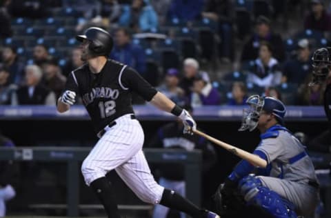 DENVER, CO – SEPTEMBER 29: Colorado Rockies first baseman Mark Reynolds #12 hits a two-run home run scoring Trevor Story against the Los Angeles Dodgers in the first inning at Coors Field September 29, 2017. (Photo by Andy Cross/The Denver Post via Getty Images)