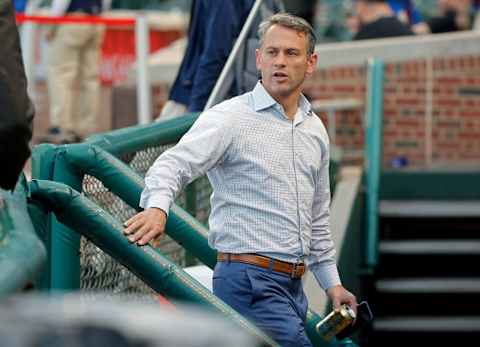 CHICAGO, IL – APRIL 18: Executive Vice President and General Manager Jed Hoyer of the Chicago Cubs talks to media as he walks in to the dugout before the game against the Milwaukee Brewers at Wrigley Field on April 18, 2017 in Chicago, Illinois. (Photo by Jon Durr/Getty Images)