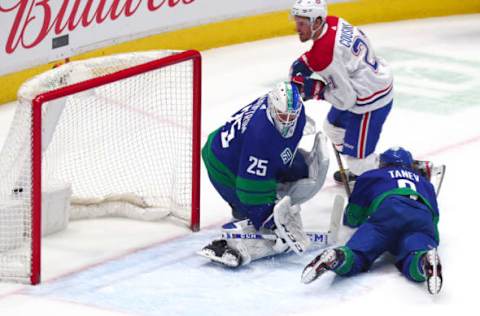 VANCOUVER, BC – DECEMBER 17: Montreal Canadiens Center Nick Cousins (21) scores on Vancouver Canucks Goalie Jacob Markstrom (25) during their NHL game at Rogers Arena on December 17, 2019 in Vancouver, British Columbia, Canada. (Photo by Devin Manky/Icon Sportswire via Getty Images)