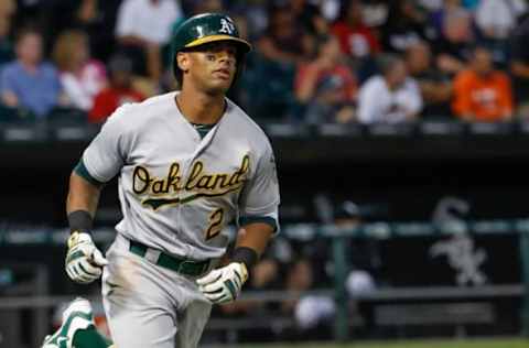 Aug 19, 2016; Chicago, IL, USA; Oakland Athletics left fielder Khris Davis (2) rounds the bases after hitting a two-run home run off of Chicago White Sox starting pitcher James Shields (not pictured) during the third inning at U.S. Cellular Field. Mandatory Credit: Kamil Krzaczynski-USA TODAY Sports