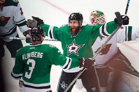 Apr 14, 2016; Dallas, TX, USA; Dallas Stars right wing Patrick Eaves (18) and defenseman John Klingberg (3) celebrate Eaves goal against Minnesota Wild goalie Devan Dubnyk (40) during the third period in game one of the first round of the 2016 Stanley Cup Playoffs at American Airlines Center. The Stars shut out the Wild 4-0. Mandatory Credit: Jerome Miron-USA TODAY Sports