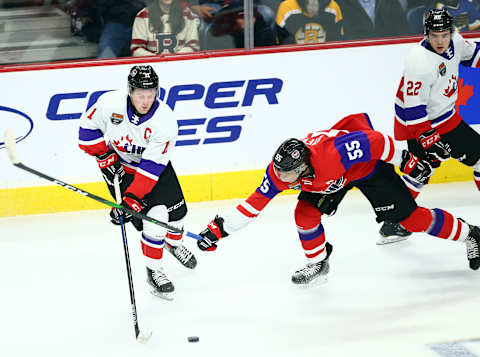 Alexis Lafreniere #11 of Team White and Quinton Byfield #55 of Team Red battle for the puck during the first period of the 2020 CHL/NHL Top Prospects Game. (Photo by Vaughn Ridley/Getty Images)