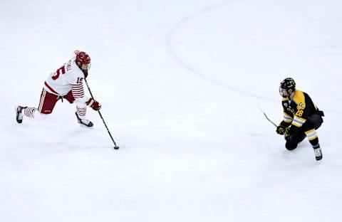 Defenseman Ian Mitchell #15 of the Denver Pioneers. (Photo by Lizzy Barrett/Getty Images)