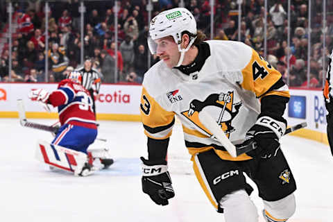 MONTREAL, CANADA – DECEMBER 13: Jansen Harkins #43 of the Pittsburgh Penguins celebrates after scoring the game-winning goal in a shootout against the Montreal Canadiens at the Bell Centre on December 13, 2023 in Montreal, Quebec, Canada. The Pittsburgh Penguins defeated the Montreal Canadiens 4-3 in a shootout. (Photo by Minas Panagiotakis/Getty Images)