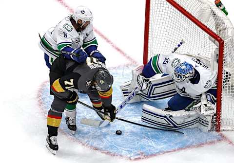 Thatcher Demko #35 of the Vancouver Canucks stops a shot against William Karlsson #71 of the Vegas Golden Knights during the third period in Game Seven. (Photo by Bruce Bennett/Getty Images)