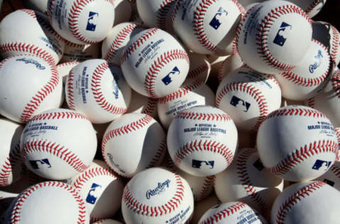 KANSAS CITY, MO – OCTOBER 15: A detailed view of baseballs in a basket on the field during batting practice prior to Game Four of the American League Championship Series between the Baltimore Orioles and the Kansas City Royals at Kauffman Stadium on October 15, 2014 in Kansas City, Missouri. (Photo by Jamie Squire/Getty Images)