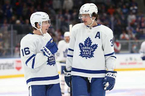 Nov 21, 2021; Elmont, New York, USA; Toronto Maple Leafs right wing Mitchell Marner (16) talks with Toronto Maple Leafs  Mandatory Credit: Tom Horak-USA TODAY Sports