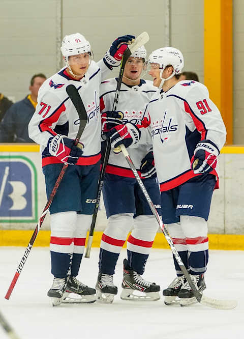 NASHVILLE, TN – SEPTEMBER 8: Kody Clark #71, Connor McMichael #24 and Joe Snively #91of the Washington Capitals celebrate a goal against the Nashville Predators during an NHL Prospects game at Ford Ice Center on September 8, 2019 in Antioch, Tennessee. (Photo by John Russell/NHLI via Getty Images)