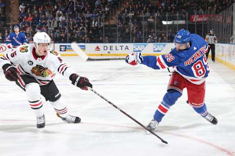 NEW YORK, NY – JANUARY 17: Pavel Buchnevich #89 of the New York Rangers shoots the puck against Connor Murphy #5 of the Chicago Blackhawks at Madison Square Garden on January 17, 2019 in New York City. The New York Rangers won 4-3. (Photo by Jared Silber/NHLI via Getty Images)