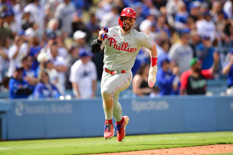 May 3, 2023; Los Angeles, California, USA; Philadelphia Phillies designated hitter Bryce Harper (3) runs home to score against the Los Angeles Dodgers during the ninth inning at Dodger Stadium. Mandatory Credit: Gary A. Vasquez-USA TODAY Sports