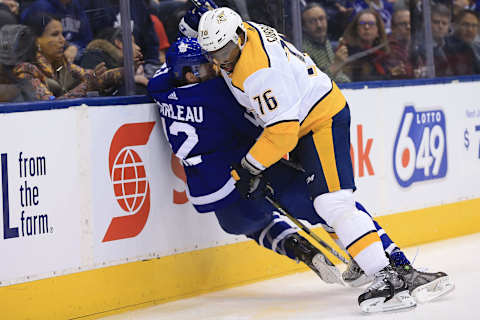 TORONTO, ON-Toronto Maple Leafs Patrick Marleau gets smashed by P.K. Subban of the Nashville Predators. in Toronto on Monday. This was the start of their tussle. (Rene Johnston/Toronto Star) (Rene Johnston/Toronto Star via Getty Images)