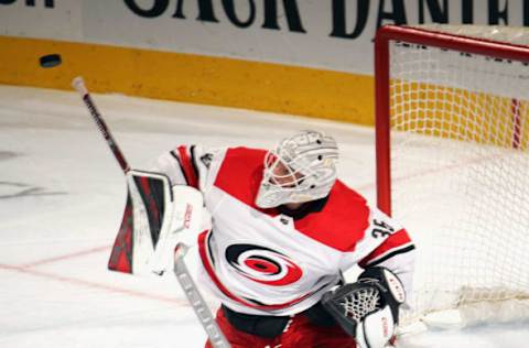 PHILADELPHIA, PENNSYLVANIA – APRIL 06: Curtis McElhinney #35 of the Carolina Hurricanes makes the third period save against the Philadelphia Flyers at the Wells Fargo Center on April 06, 2019 in Philadelphia, Pennsylvania. The Hurricanes defeated the Flyers 4-3. (Photo by Bruce Bennett/Getty Images)