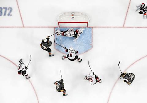 LAS VEGAS, NV – NOVEMBER 29: Arizona Coyotes goaltender Darcy Kuemper (35) blocks a shot from Vegas Golden Knights right wing Alex Tuch (89) during a regular season game Friday, Nov. 29, 2019, at T-Mobile Arena in Las Vegas, Nevada. (Photo by: Marc Sanchez/Icon Sportswire via Getty Images)