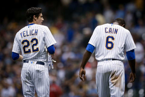 MILWAUKEE, WI – SEPTEMBER 14: Christian Yelich #22 and Lorenzo Cain #6 of the Milwaukee Brewers  (Photo by Dylan Buell/Getty Images)