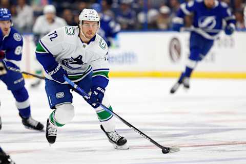 Anthony Beauvillier on the puck for the Canucks in a game against the Lightning. (Photo by Mike Ehrmann/Getty Images)