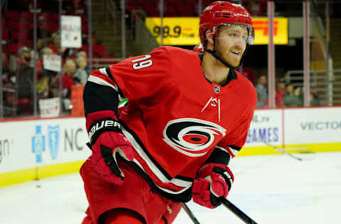 RALEIGH, NC – OCTOBER 29: Dougie Hamilton #19 of the Carolina Hurricanes skates during warmups prior to an NHL game against the Calgary Flames on October 29, 2019 at PNC Arena in Raleigh, North Carolina. (Photo by Gregg Forwerck/NHLI via Getty Images)