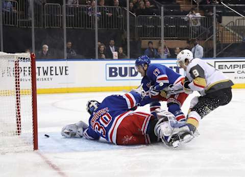 A shot by Alex Tuch #89 (not shown) of the Vegas Golden Knights gets past Henrik Lundqvist #30 of the New York Rangers