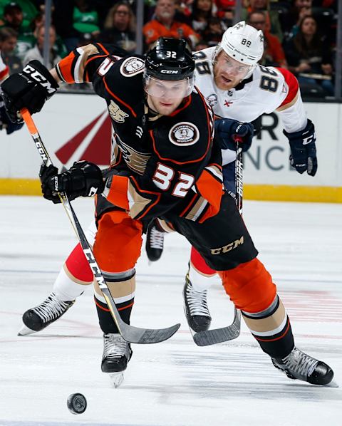 ANAHEIM, CA – MARCH 17: Jacob Larsson #32 of the Anaheim Ducks controls the puck with pressure from Jamie McGinn #88 of the Florida Panthers during the game on March 17, 2019, at Honda Center in Anaheim, California. (Photo by Debora Robinson/NHLI via Getty Images)