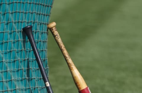 OAKLAND, CA – APRIL 07: Detailed view of two bats against the backstop during batting practice before the game between the Oakland Athletics and the Seattle Mariners at O.co Coliseum on April 7, 2012 in Oakland, California. The Seattle Mariners defeated the Oakland Athletics 8-7. (Photo by Jason O. Watson/Getty Images)