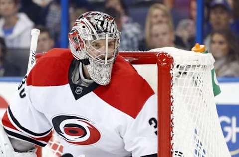 NHL Power Rankings: Carolina Hurricanes goalie Cam Ward (30) looks on against the Tampa Bay Lightning during the second period at Amalie Arena. Mandatory Credit: Kim Klement-USA TODAY Sports