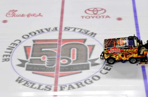 Oct 20, 2016; Philadelphia, PA, USA; A Zamboni prepares the ice featuring the Flyers 50th anniversary logo before the home opener between Anaheim Ducks and Philadelphia Flyers at the Wells Fargo Center. Mandatory Credit: Eric Hartline-USA TODAY Sports