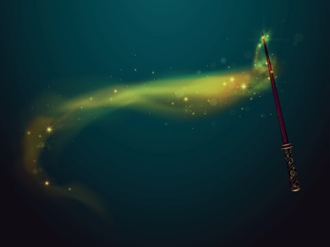 An enchanting-looking magic wand with a green glow around it as if casting magic