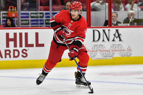 RALEIGH, NC – NOVEMBER 07: Carolina Hurricanes Defenceman Noah Hanifin (5) skates with the puck during a game between the Florida Panthers and the Carolina Hurricanes at the PNC Arena in Raleigh, NC on November 7 2017. Carolina defeated Florida 3-1. (Photo by Greg Thompson/Icon Sportswire via Getty Images)