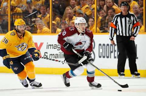 NASHVILLE, TN – APRIL 12: Sven Andrighetto #10 of the Colorado Avalanche skates against Ryan Hartman #38 of the Nashville Predators in Game One of the Western Conference First Round during the 2018 NHL Stanley Cup Playoffs at Bridgestone Arena on April 12, 2018 in Nashville, Tennessee. (Photo by John Russell/NHLI via Getty Images) *** Local Caption *** Sven Andrighetto;Ryan Hartman