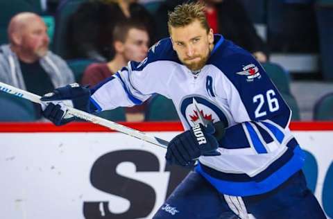 Mar 16, 2016; Calgary, Alberta, CAN; Winnipeg Jets right wing Blake Wheeler (26) skates during the warmup period against the Calgary Flames at Scotiabank Saddledome. Calgary Flames won 4-1. Mandatory Credit: Sergei Belski-USA TODAY Sports