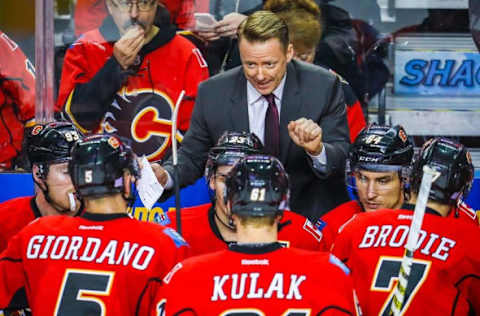 Nov 16, 2016; Calgary, Alberta, CAN; Calgary Flames head coach Glen Gulutzan on his bench against the Arizona Coyotes during the overtime period at Scotiabank Saddledome. Calgary Flames won 2-1. Mandatory Credit: Sergei Belski-USA TODAY Sports