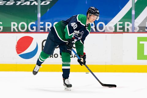 VANCOUVER, BC – FEBRUARY 19: Elias Pettersson #40 of the Vancouver Canucks shoots the puck during the pre-game warmup prior to NHL hockey action. (Photo by Rich Lam/Getty Images)