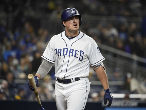 SAN DIEGO, CA – APRIL 16: Hunter Renfroe #10 of the San Diego Padres walks back to the dugout after striking out during the sixth inning of a baseball game against the Los Angeles Dodgers at PETCO Park on April 16, 2018 in San Diego, California. (Photo by Denis Poroy/Getty Images)