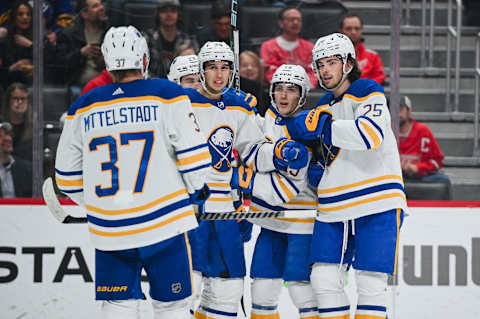 Apr 6, 2023; Detroit, Michigan, USA; Buffalo Sabres center Dylan Cozens (24) celebrates his goal with teammates during the first period against the Detroit Red Wings at Little Caesars Arena. Mandatory Credit: Tim Fuller-USA TODAY Sports