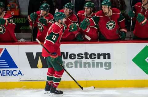 Oct 20, 2016; Saint Paul, MN, USA; Minnesota Wild forward Eric Staal (12) celebrates his goal with teammates during the third period against the Toronto Maple Leafs at Xcel Energy Center. The Wild defeated the Maple Leafs 3-2. Mandatory Credit: Brace Hemmelgarn-USA TODAY Sports