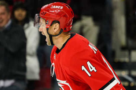 RALEIGH, NC – JANUARY 21: Carolina Hurricanes Right Wing Justin Williams (14) reacts after scoring during a game between the Carolina Hurricanes and the Winnipeg Jets on January 21, 2020 at the PNC Arena in Raleigh, NC. (Photo by Greg Thompson/Icon Sportswire via Getty Images)