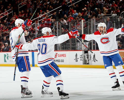 Christian Folin #32, Tomas Tatar #90 and Marco Scandella #28 (Photo by Paul Bereswill/Getty Images)