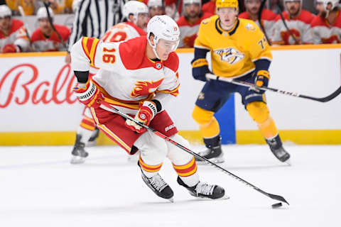 Nov 22, 2023; Nashville, Tennessee, USA; Calgary Flames defenseman Nikita Zadorov (16) skates against the Nashville Predators] during the first period at Bridgestone Arena. Mandatory Credit: Steve Roberts-USA TODAY Sports