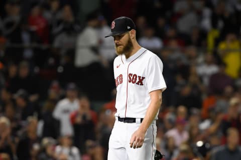 Oct 20, 2021; Boston, Massachusetts, USA; Boston Red Sox starting pitcher Chris Sale (41) walks off of the field after being taking out of the game during the sixth inning of game five of the 2021 ALCS against the Houston Astros at Fenway Park. Mandatory Credit: Bob DeChiara-USA TODAY Sports