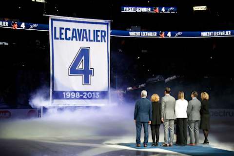 Feb 10, 2018; Tampa, FL, USA; Tampa Bay Lightning former center Vincent Lecavalier (middle) and his family watch while his retired jersey number is raised to the rafters as he is honored before a game between the Los Angeles Kings and the Lightning at Amalie Arena. Mandatory Credit: Kim Klement-USA TODAY Sports